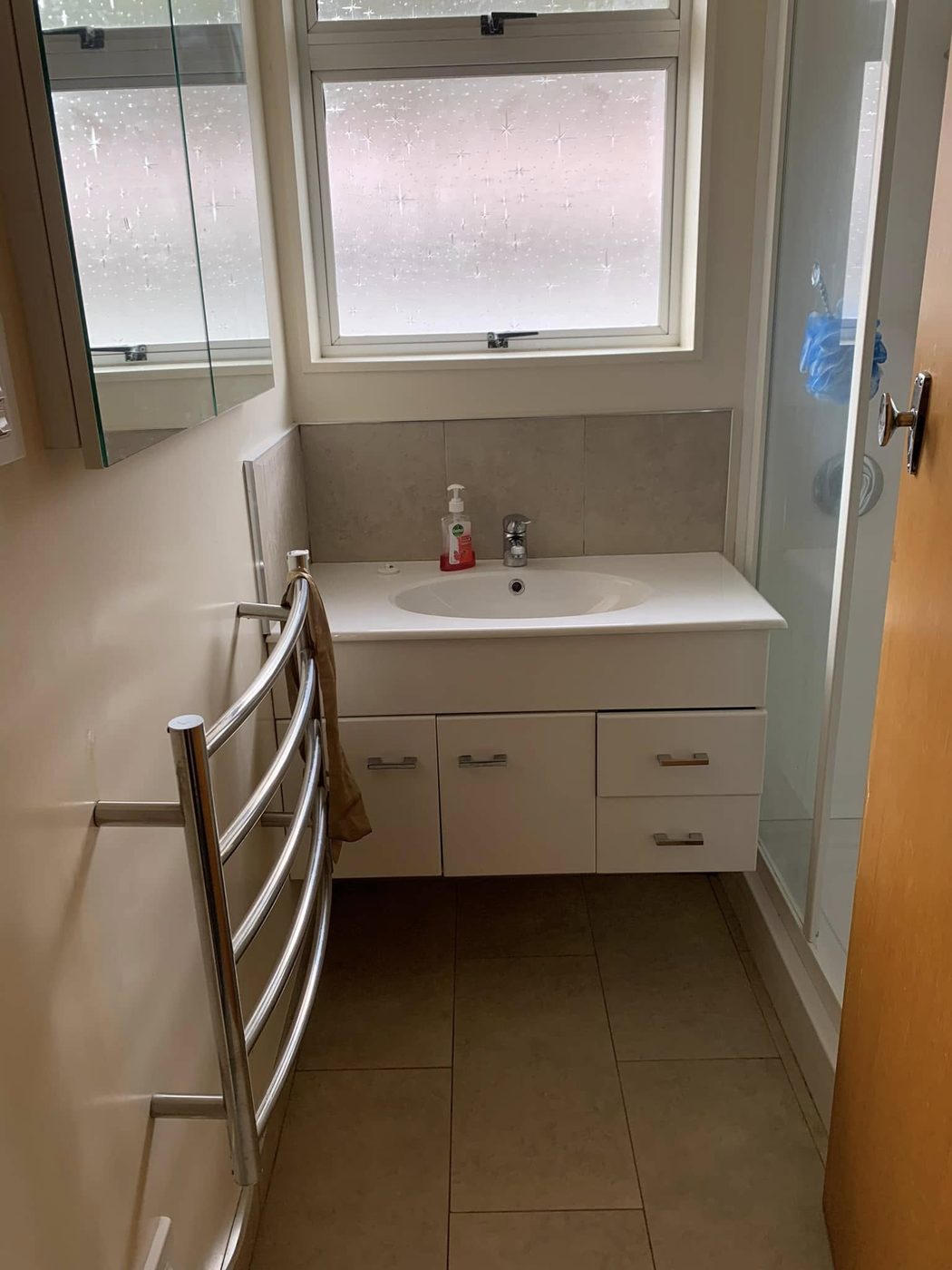 After: a clean, tidy bathroom vanity