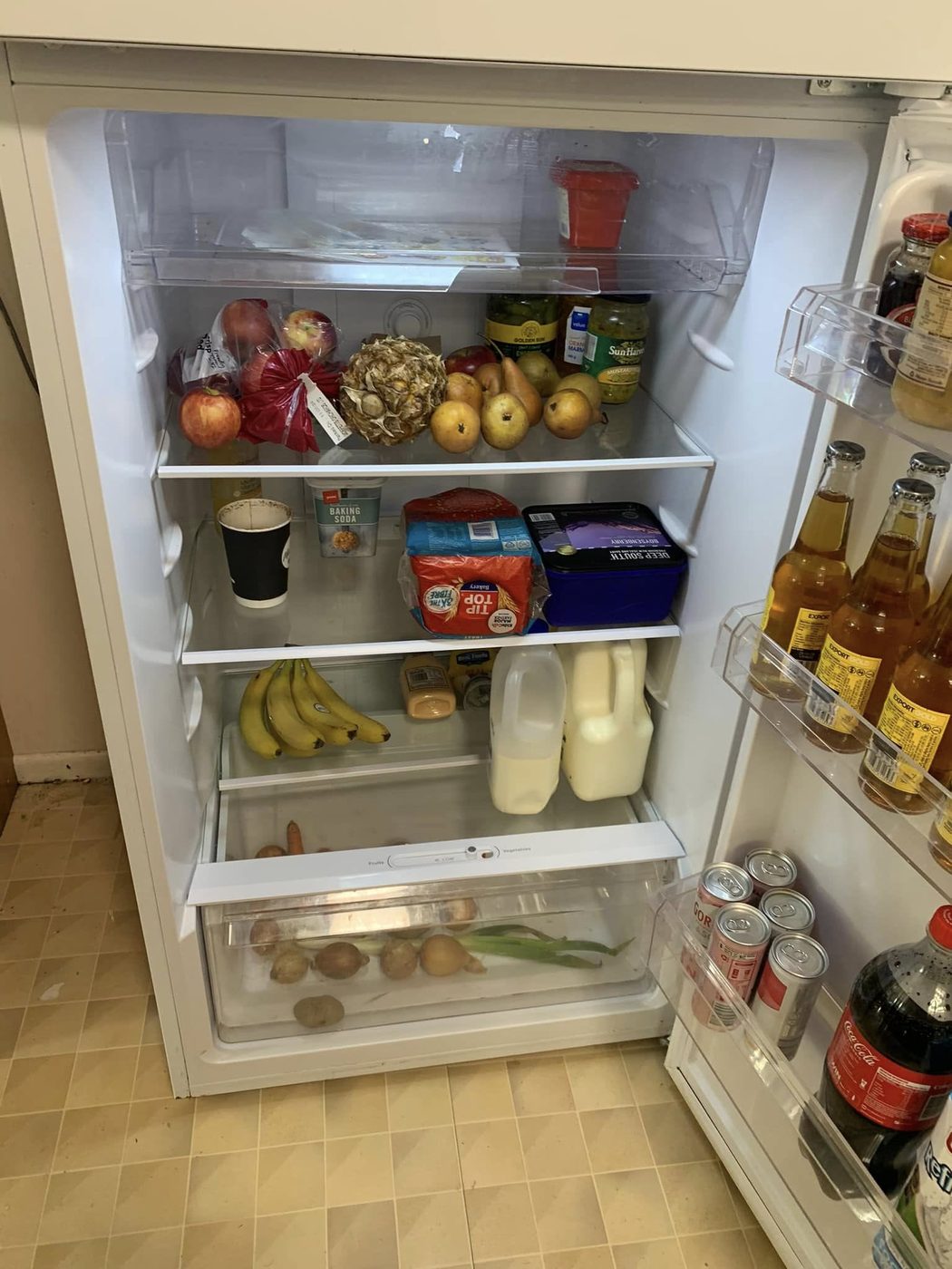 After: a freshly stocked, clean fridge